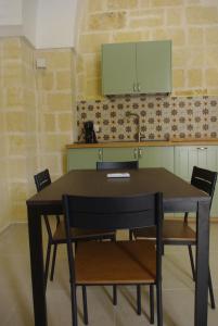 Η κουζίνα ή μικρή κουζίνα στο Casa Ninì +13 φωτογραφίες