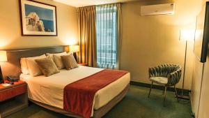 Postel nebo postele na pokoji v ubytování Hotel Eurotel El Bosque