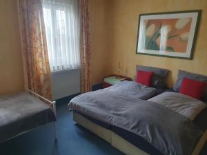 Postel nebo postele na pokoji v ubytování Gasthaus Krone