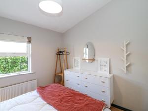 Una cama o camas en una habitación de The Sleepy Shell