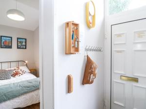 Una cama o camas en una habitación de The Sleepy Shell