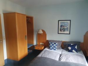 Postel nebo postele na pokoji v ubytování Gasthaus Krone