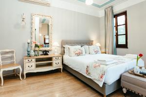 Postel nebo postele na pokoji v ubytování Hotel Kastro