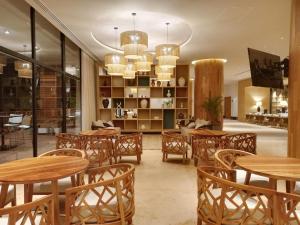 TV a/nebo společenská místnost v ubytování Hotel Mundo Maya Nuevo Uxmal