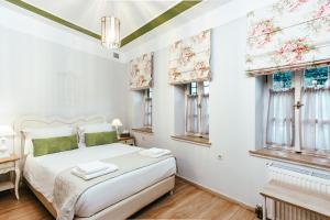 Postel nebo postele na pokoji v ubytování Hotel Kastro