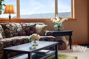 a living room with a couch and a table at RC 309 Riverstone Village in Coeur d'Alene