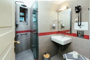 Koupelna v ubytování Hotel Kastro