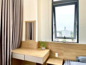 Giường trong phòng chung tại Dr 502 Modern Studio With City View And Kitchen