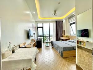 TV/trung tâm giải trí tại Dr 502 Modern Studio With City View And Kitchen