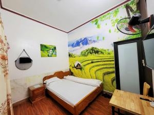 Postel nebo postele na pokoji v ubytování Minh Hưng Hostel + 37 fotografií