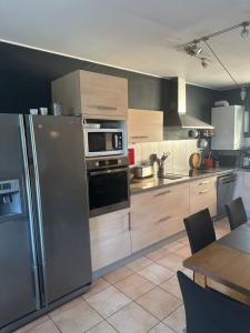 Fotografie z fotogalerie ubytování Un havre de verdure en ville v destinaci Colmar + 20 fotografií