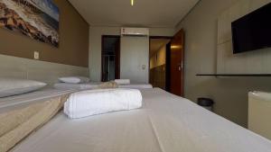 Postel nebo postele na pokoji v ubytování Hotel Boreas