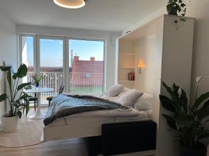 Ένα ή περισσότερα κρεβάτια σε δωμάτιο στο APARTMENT Blue Heaven