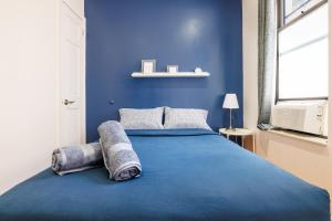 Katil atau katil-katil dalam bilik di Discover the Comfort of Columbia University Area-1