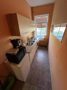 Kuchyň nebo kuchyňský kout v ubytování Penzion Fajn Klub + 25 fotografií