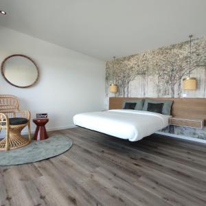 Postel nebo postele na pokoji v ubytování Afrodite Styling Penthouse