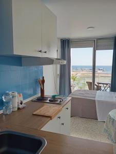 Η κουζίνα ή μικρή κουζίνα στο Romántico Loft con vistas impresionantes