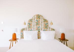 Praia do Canal Nature Retreat - Small Luxury Hotels of the World客房内的一张或多张床位