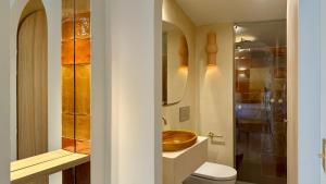 Koupelna v ubytování Cosy Rooms Tapinería
