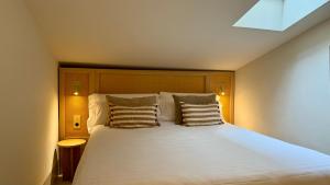 Postel nebo postele na pokoji v ubytování Cosy Rooms Tapinería