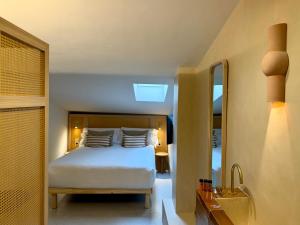 Postel nebo postele na pokoji v ubytování Cosy Rooms Tapinería
