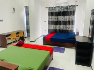 Postel nebo postele na pokoji v ubytování Hotel Ceylonia Colombo + 16 fotografií