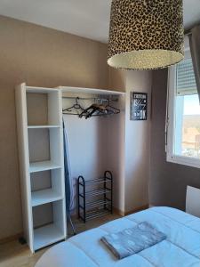 Postel nebo postele na pokoji v ubytování CHEZ MIMONa