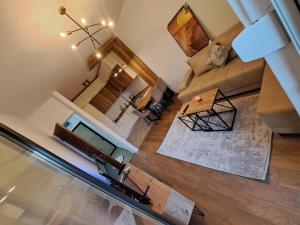 an overhead view of a living room with a couch at Stunning view apartment Bijela in Bijela