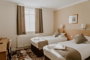 The Prince of Wales Hotel Berkeley, A38 M5客房内的一张或多张床位