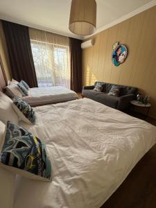 Postel nebo postele na pokoji v ubytování Nomad777