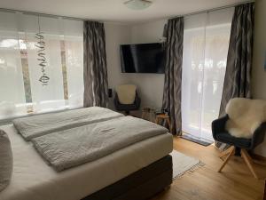 Postel nebo postele na pokoji v ubytování Haus Cäcilia