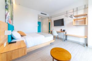Postel nebo postele na pokoji v ubytování Smart Hotel