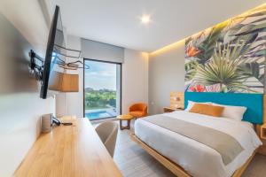 TV a/nebo společenská místnost v ubytování Smart Hotel