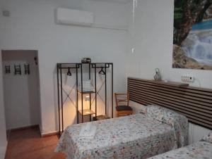 Ένα ή περισσότερα κρεβάτια σε δωμάτιο στο Alojamiento Rural Villa Rosarito +47 φωτογραφίες