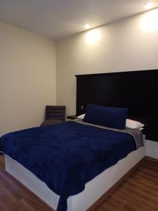 Postel nebo postele na pokoji v ubytování Hotel Libertad