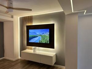 TV a/nebo společenská místnost v ubytování Moderno apartamento reformado con ascensor