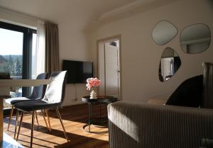 Posezení v ubytování Apartmán pod Plešivcem
