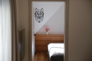 Postel nebo postele na pokoji v ubytování Apartmán pod Plešivcem