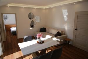 Posezení v ubytování Apartmán pod Plešivcem
