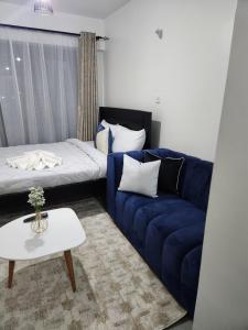 Χώρος καθιστικού στο Comfort Haven Tsavo