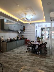 Kuchyň nebo kuchyňský kout v ubytování Hotel & Homestay LABUBU