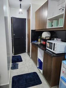 Η κουζίνα ή μικρή κουζίνα στο Comfort Haven Tsavo