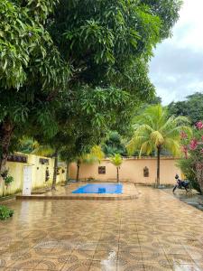 Taman di luar Casa de praia +7 gambar