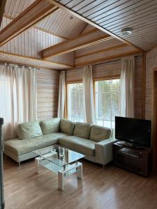 Posezení v ubytování Tiiringolf Cottages + 37 fotografií