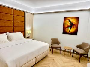 Rúm í herbergi á Hotel Fieri