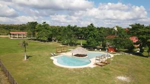 an aerial view of a backyard with a swimming pool at Hacienda Mi Soledad in Balancán de Domínguez