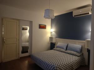 Postel nebo postele na pokoji v ubytování B&B SAN FRANCESCO Pescara Centro