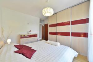Posteľ alebo postele v izbe v ubytovaní Cozy beach apartment Split