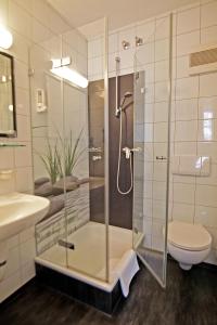 Koupelna v ubytování Art-Hotel Erlangen + 37 fotografií
