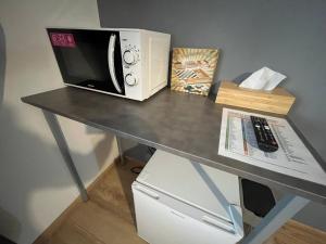 Kuchyň nebo kuchyňský kout v ubytování APARTMENTS TRENČÍN